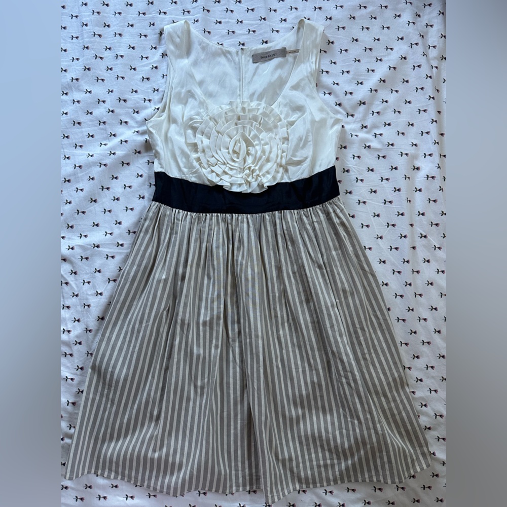 Elegant Striped Dress with Floral Detail